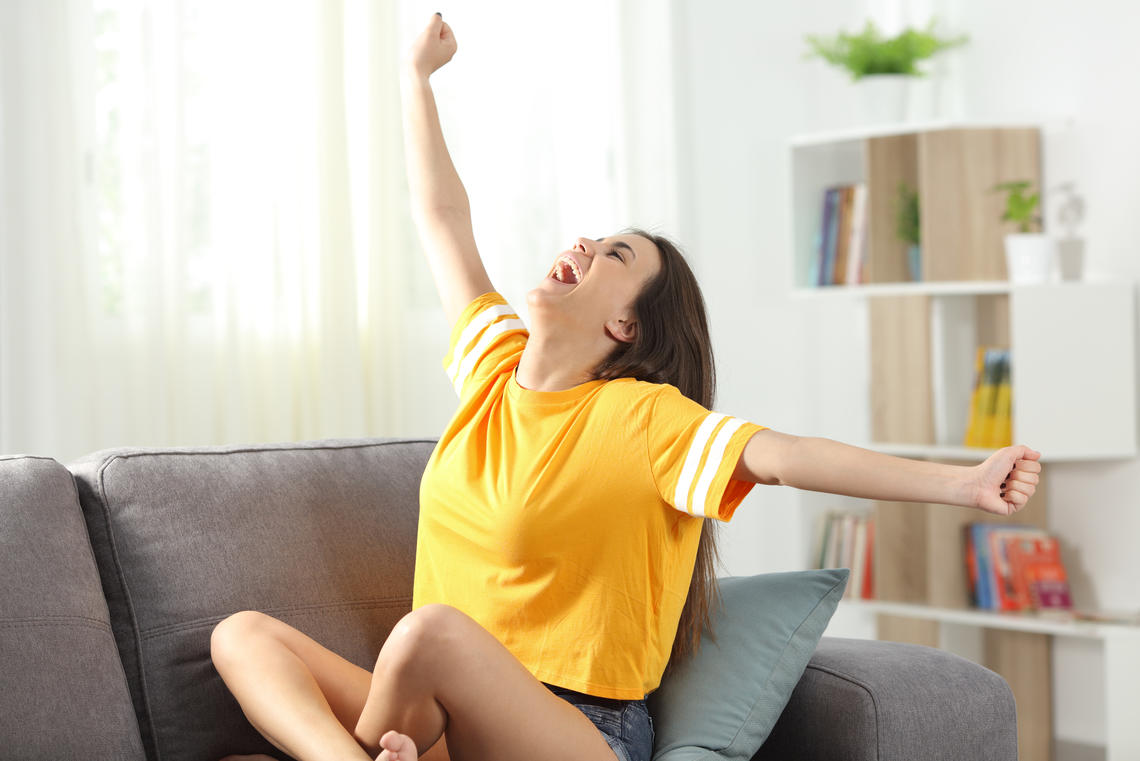 Teenage female stretching