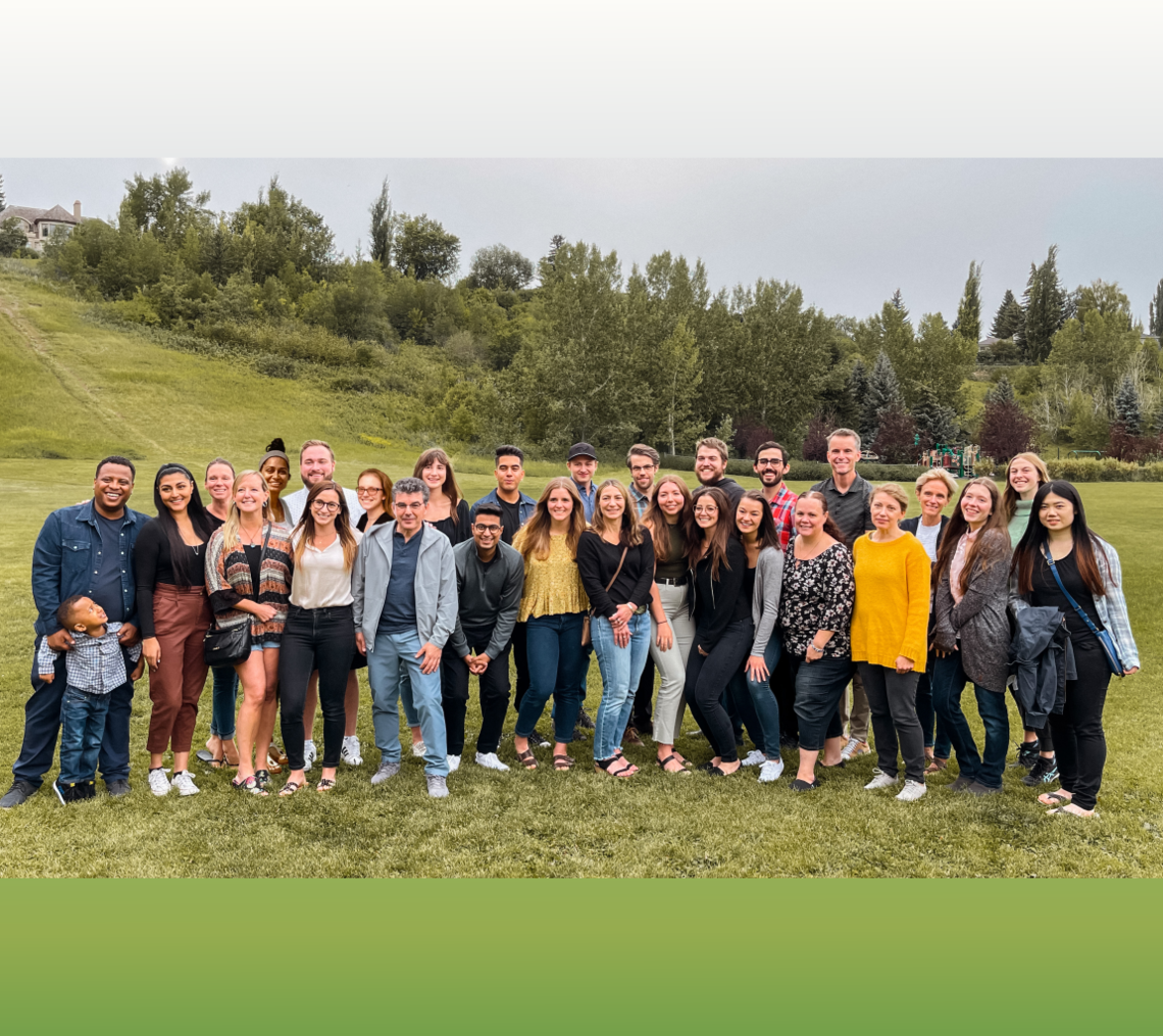 Members of the BCI team standing in a field 