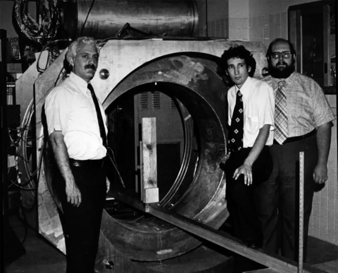 Dr. Damadian (left) and colleagues with the first MRI machine