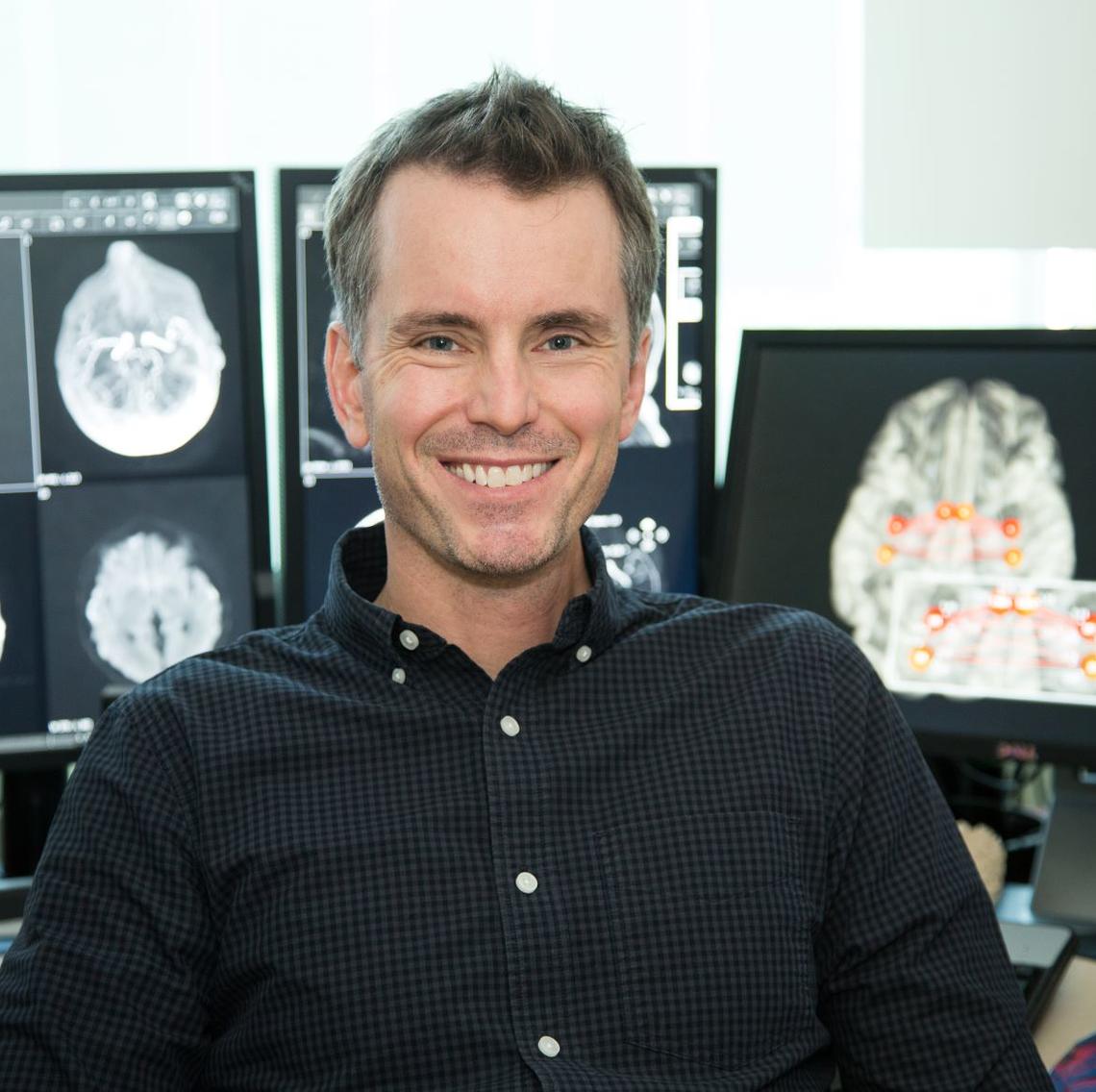 Dr. Adam Kirton
