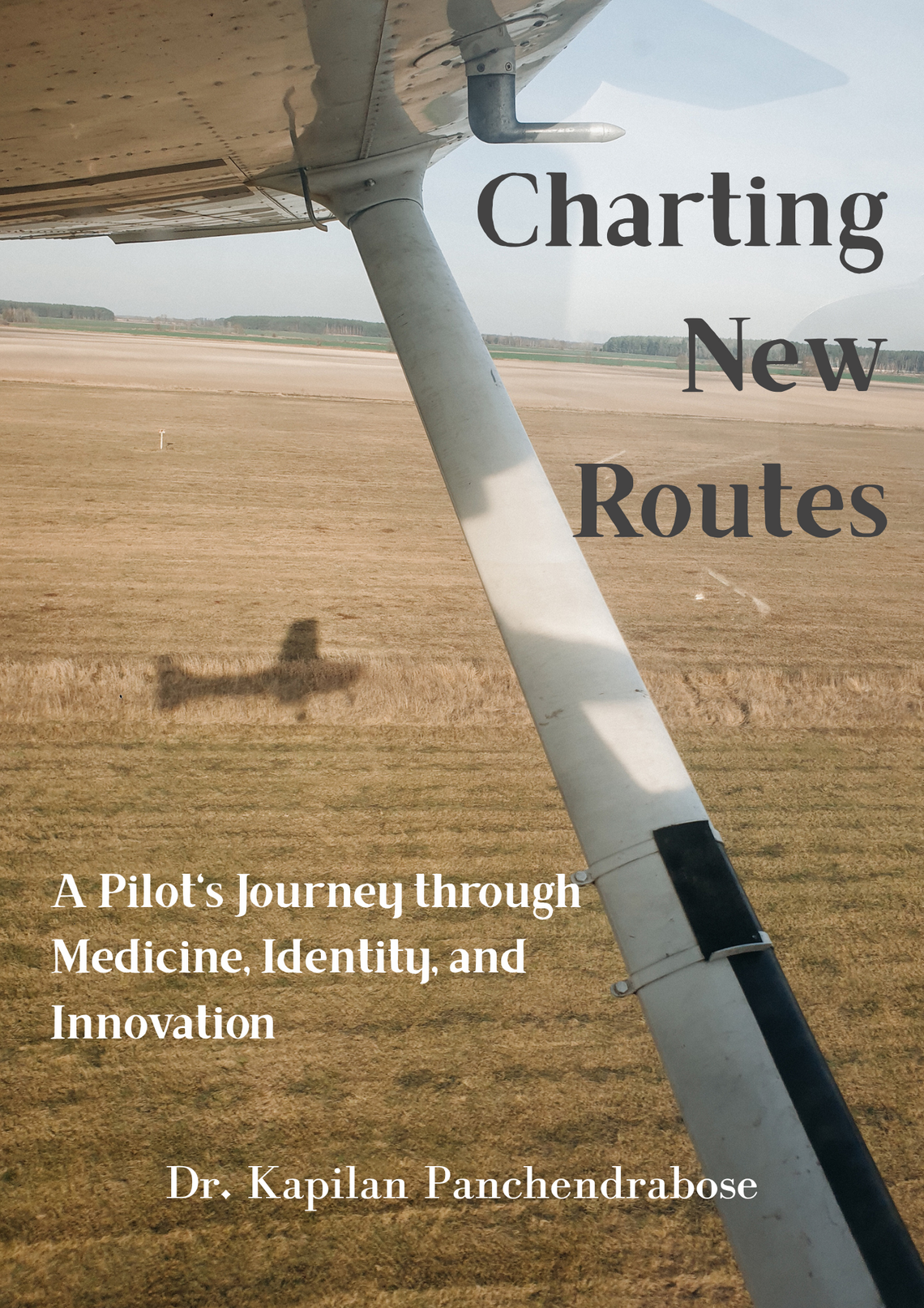 A phote take from the window of a plain passing over a wheat field with the title "Charting New Routes: A Pilot's Journey through Medicine, Identity, and Innovation" by Dr. Kapilan Panchendrabose