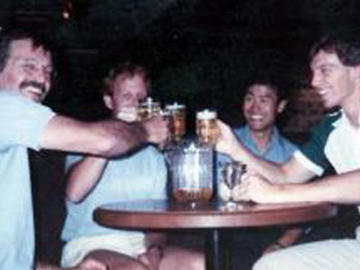 The McGhee lab celebrates success in cloning the first C. elegans gene in Calgary in 1987. From L to R Jim McGhee, Brian Kennedy (now at Merck Frosst) Kenichi Ito (University of Calgary) Chris Beh (now at Simon Fraser University)