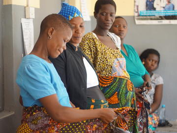Pregnant mothers chat while waiting for prenatal checkups, Ngudu, Kwimba