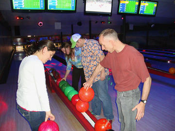 Selecting the best ball at the VIL Bowling Night, Calgary, Alberta, November 2010.