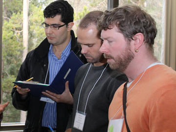 VIL fellows and staff judging posters at the Alberta BME Meeting, Banff, Alberta, October 2013.