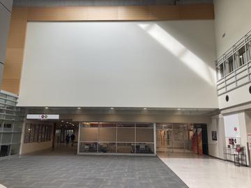 The blank wall space where the mural is now installed