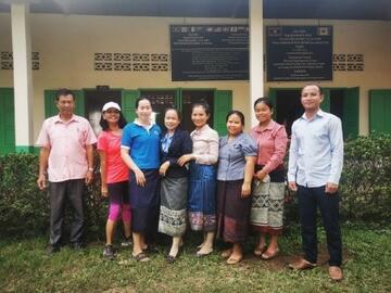 School staff and Noy