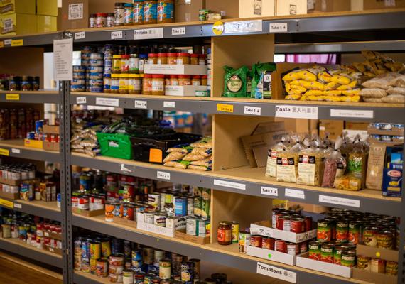 Picture of pantry shelves with a variety of dry goods food items.
