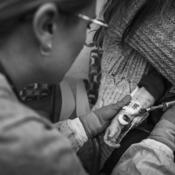 Healthcare worker doing bloodwork on patient
