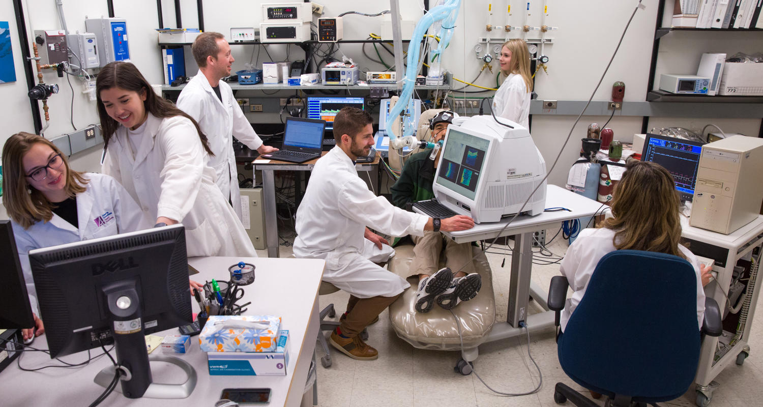 Brain and mental health researchers collaborating in lab