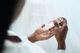 person using hand sanitizer