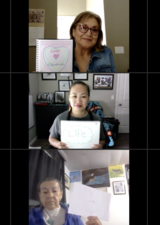 People holding signs of words of gratitude