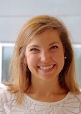 Smiling woman with shoulder length blonde hair