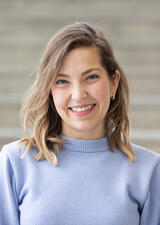 woman with blonde hair smiling