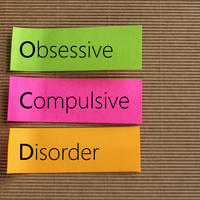 Coloured stripes fo paper stating OCD