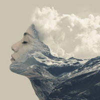 Head of woman leaning forward with clouds for hair