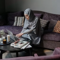 Woman sitting on a chair alone