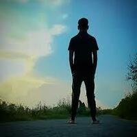 Man looking into the sunset