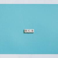 OCD written on small tiles