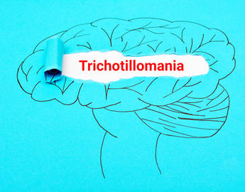 Illustrated brain with trichotillomania written across it