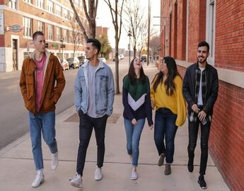 Teenagers walking in street