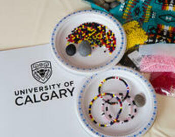 University of Calgary logo with items