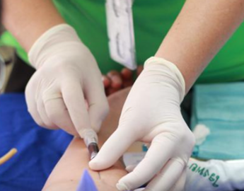 Medical professional giving a patient an injection